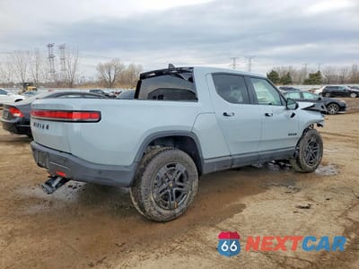 Trzecie zdjęcie samochodu z tyłu: 2025 RIVIAN R1T ADVENTURE VIN:7FCTGBAA0SN040168 - miniatura