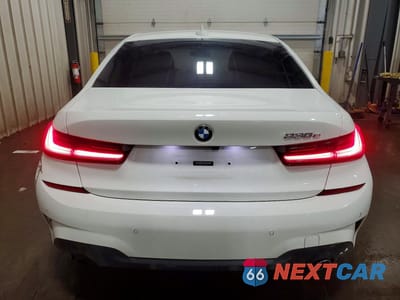Zdjęcie 6 z 12 samochodu: 2021 BMW 330E VIN:3MW5P7J00M8B60963 - miniatura