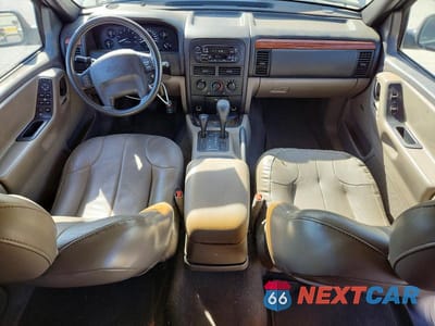 Zdjęcie 8 z 12 samochodu: 1999 JEEP GRAND CHEROKEE LAREDO VIN:1J4GW58N6XC739919 - miniatura