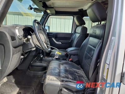 Zdjęcie 7 z 12 samochodu: 2012 JEEP WRANGLER UNLIMITED SAHARA VIN:1C4BJWEG6CL188752 - miniatura