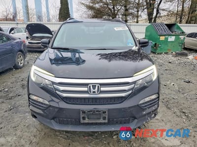 Piąte zdjęcie samochodu w środku: 2016 HONDA PILOT EXLN VIN:5FNYF6H7XGB049224 - miniatura