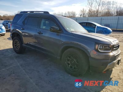 Czwarte zdjęcie samochodu z boku: 2026 HONDA PASSPORT TRAILSPORT ELITE VIN:5FNYF9H83TB004808 - miniatura