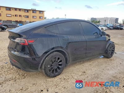 Trzecie zdjęcie samochodu z tyłu: 2024 TESLA MODEL Y VIN:7SAYGDEE7RA214671 - miniatura