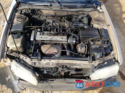 Zdjęcie 11 z 12 samochodu: 1997 TOYOTA COROLLA DX VIN:1NXBB02E9VZ596488 - miniatura