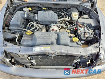 Zdjęcie 11 z 12 samochodu: 2004 DODGE DAKOTA QUAD SLT VIN:1D7HG48N84S758058 - miniatura