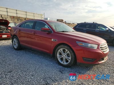 Czwarte zdjęcie samochodu z boku: 2014 FORD TAURUS SEL VIN:1FAHP2E82EG177887 - miniatura