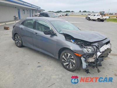 Czwarte zdjęcie samochodu z boku: 2018 HONDA CIVIC LX VIN:SHHFK7H20JU413511 - miniatura