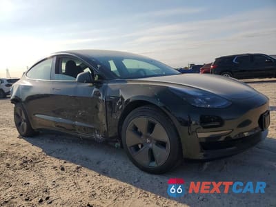 Czwarte zdjęcie samochodu z boku: 2023 TESLA MODEL 3 VIN:5YJ3E1EA0PF547061 - miniatura