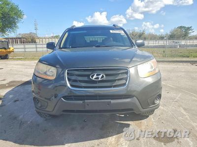 Piąte zdjęcie samochodu w środku: 2010 HYUNDAI SANTA FE GLS VIN:5NMSG3AB2AH395189 - miniatura