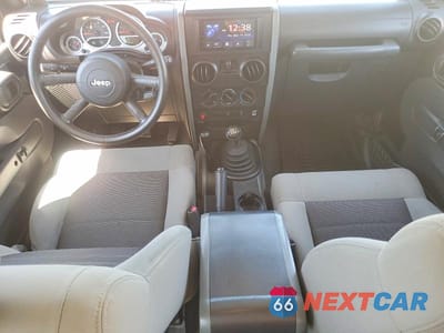 Zdjęcie 8 z 12 samochodu: 2010 JEEP WRANGLER SPORT VIN:1J4AA2D18AL228631 - miniatura