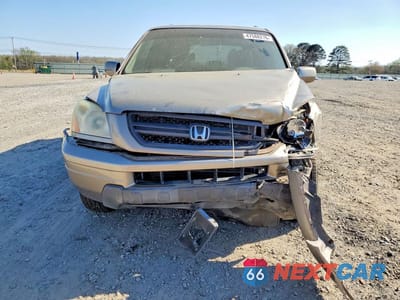 Piąte zdjęcie samochodu w środku: 2003 HONDA PILOT EXL VIN:2HKYF18603H617583 - miniatura
