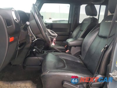 Zdjęcie 7 z 12 samochodu: 2014 JEEP WRANGLER UNLIMITED VIN:1C4HJWFG5EL263226 - miniatura