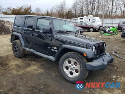 Czwarte zdjęcie samochodu z boku: 2015 JEEP WRANGLER UNLIMITED SAHARA VIN:1C4HJWEG6FL524883 - miniatura