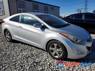 Czwarte zdjęcie samochodu z boku: 2013 HYUNDAI ELANTRA COUPE GS VIN:KMHDH6AE1DU007430 - miniatura