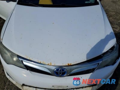 Zdjęcie 11 z 11 samochodu: 2012 TOYOTA CAMRY HYBRID LE VIN:4T1BD1FKXCU042230 - miniatura