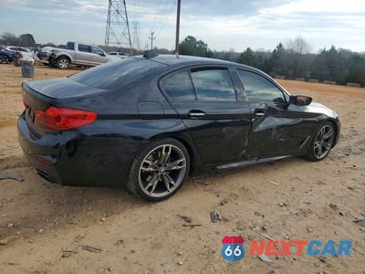 Trzecie zdjęcie samochodu z tyłu: 2018 BMW M550XI VIN:WBAJB9C5XJB049879 - miniatura