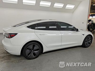 Trzecie zdjęcie samochodu z tyłu: 2019 TESLA MODEL 3 VIN:5YJ3E1EA3KF328328 - miniatura