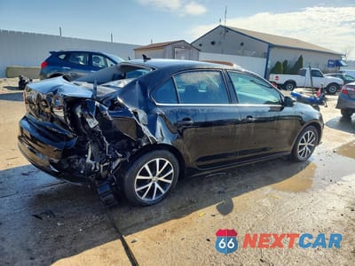 Trzecie zdjęcie samochodu z tyłu: 2017 VOLKSWAGEN JETTA SE VIN:3VWB67AJXHM246616 - miniatura