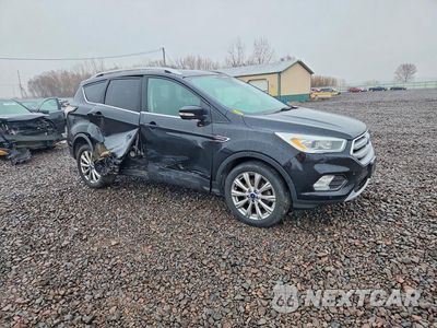 Czwarte zdjęcie samochodu z boku: 2017 FORD ESCAPE TITANIUM VIN:1FMCU0JD2HUB14181 - miniatura