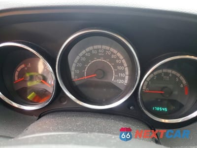 Zdjęcie 9 z 13 samochodu: 2011 DODGE CALIBER MAINSTREET VIN:1B3CB3HA6BD269364 - miniatura