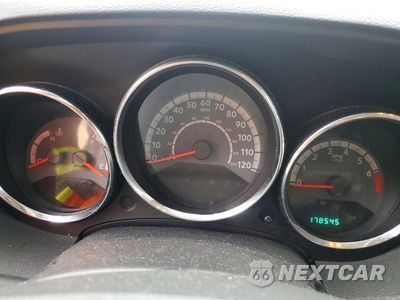 Zdjęcie 9 z 13 samochodu: 2011 DODGE CALIBER MAINSTREET VIN:1B3CB3HA6BD269364 - miniatura