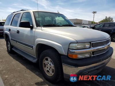 Czwarte zdjęcie samochodu z boku: 2005 CHEV TAHOE C1500 VIN:1GNEC13T35R248682 - miniatura