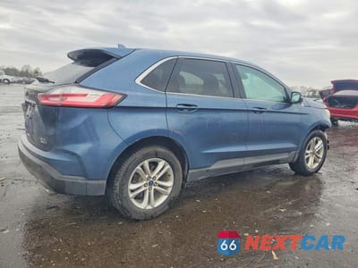 Trzecie zdjęcie samochodu z tyłu: 2019 FORD EDGE SEL VIN:2FMPK4J92KBB79300 - miniatura