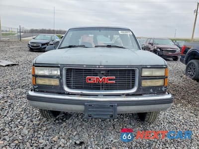 Piąte zdjęcie samochodu w środku: 1995 GMC SIERRA C1500 VIN:2GTEC19H0S1560197 - miniatura