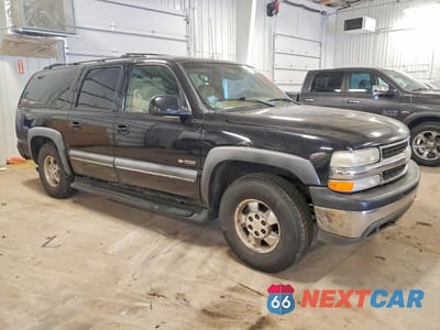 Czwarte zdjęcie samochodu z boku: 2000 CHEVROLET SUBURBAN K1500 VIN:3GNFK16T7YG106911 - miniatura