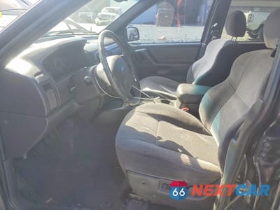 Zdjęcie 7 z 13 samochodu: 2001 JEEP GRAND CHEROKEE LAREDO VIN:1J4GW48N81C543756 - miniatura
