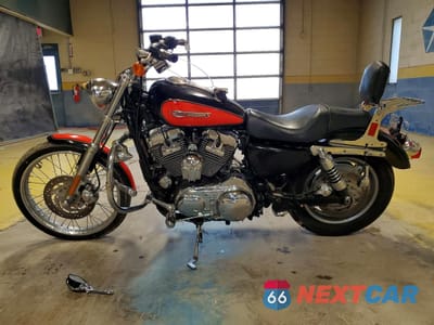 Trzecie zdjęcie samochodu z tyłu: 2009 HARLEY-DAVIDSON XL1200 C VIN:1HD1CT3169K401425 - miniatura
