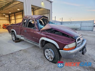 Czwarte zdjęcie samochodu z boku: 2001 DODGE DAKOTA VIN:1B7GG22N01S316387 - miniatura