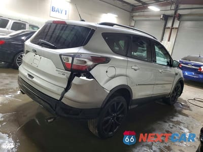 Trzecie zdjęcie samochodu z tyłu: 2017 FORD ESCAPE TITANIUM VIN:1FMCU9J90HUB41587 - miniatura