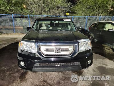 Piąte zdjęcie samochodu w środku: 2011 HONDA PILOT VIN:5FNYF3H51BB022189 - miniatura