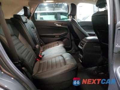 Zdjęcie 11 z 12 samochodu: 2021 FORD EDGE SEL VIN:2FMPK4J93MBA64000 - miniatura