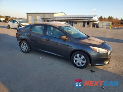 Czwarte zdjęcie samochodu z boku: 2018 FORD FOCUS S VIN:1FADP3E2XJL269962 - miniatura