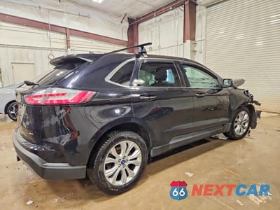 Trzecie zdjęcie samochodu z tyłu: 2021 FORD EDGE TITANIUM VIN:2FMPK4K98MBA41567 - miniatura