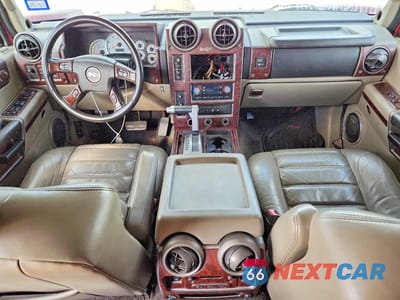 Zdjęcie 8 z 12 samochodu: 2004 HUMMER H2 VIN:5GRGN23U64H104704 - miniatura