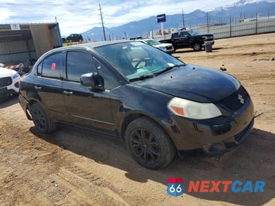 Czwarte zdjęcie samochodu z boku: 2012 SUZUKI SX4 LE VIN:JS2YC5A37C6304224 - miniatura