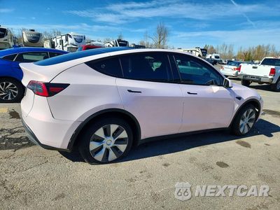 Trzecie zdjęcie samochodu z tyłu: 2023 TESLA MODEL Y VIN:7SAYGDEE0PF971153 - miniatura