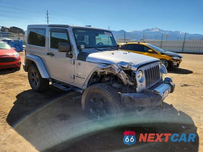 Czwarte zdjęcie samochodu z boku: 2014 JEEP WRANGLER SAHARA VIN:1C4AJWBG9EL175612 - miniatura