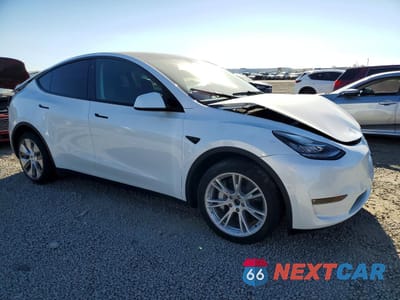 Czwarte zdjęcie samochodu z boku: 2022 TESLA MODEL Y VIN:7SAYGDEE8NF435497 - miniatura