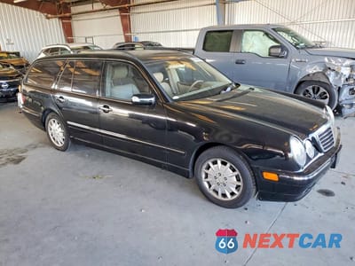 Czwarte zdjęcie samochodu z boku: 2001 MERCEDES-BENZ E 320 VIN:WDBJH65J11B308736 - miniatura