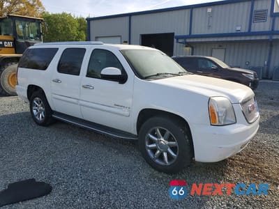 Czwarte zdjęcie samochodu z boku: 2007 GMC YUKON XL DENALI VIN:1GKFK66827J364613 - miniatura