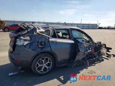 Trzecie zdjęcie samochodu z tyłu: 2017 BMW X1 XDRIVE28I VIN:WBXHT3Z31H4A57715 - miniatura