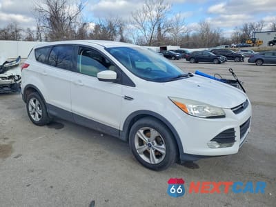 Czwarte zdjęcie samochodu z boku: 2014 FORD ESCAPE SE VIN:1FMCU0GX9EUB15728 - miniatura