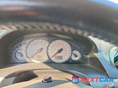 Zdjęcie 9 z 11 samochodu: 2000 MERCURY COUGAR V6 VIN:1ZWFT61L2Y5624905 - miniatura
