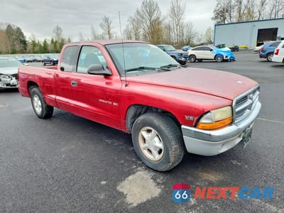 Czwarte zdjęcie samochodu z boku: 1999 DODGE DAKOTA VIN:1B7GL22X3XS302408 - miniatura