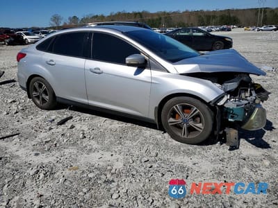 Czwarte zdjęcie samochodu z boku: 2016 FORD FOCUS SE VIN:1FADP3FE6GL218959 - miniatura