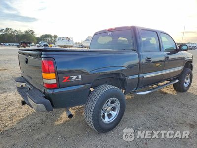 Trzecie zdjęcie samochodu z tyłu: 2004 GMC NEW SIERRA K1500 VIN:2GTEK13T041382682 - miniatura
